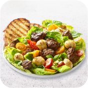 Balsamic Peppercorn Beef Sirloin Tips Caprese Salad with Grilled Bread